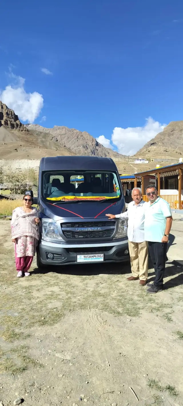Guests standing beside the Gemini Urbania in Spiti